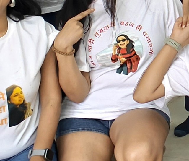 A custom printed T-shirt worn at a party